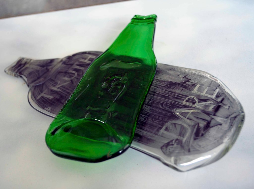 Kiln-formed, up-cycled bottles.